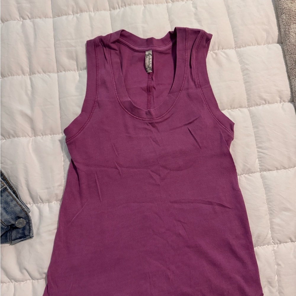 Free people purple top 
Never worn 
Size small